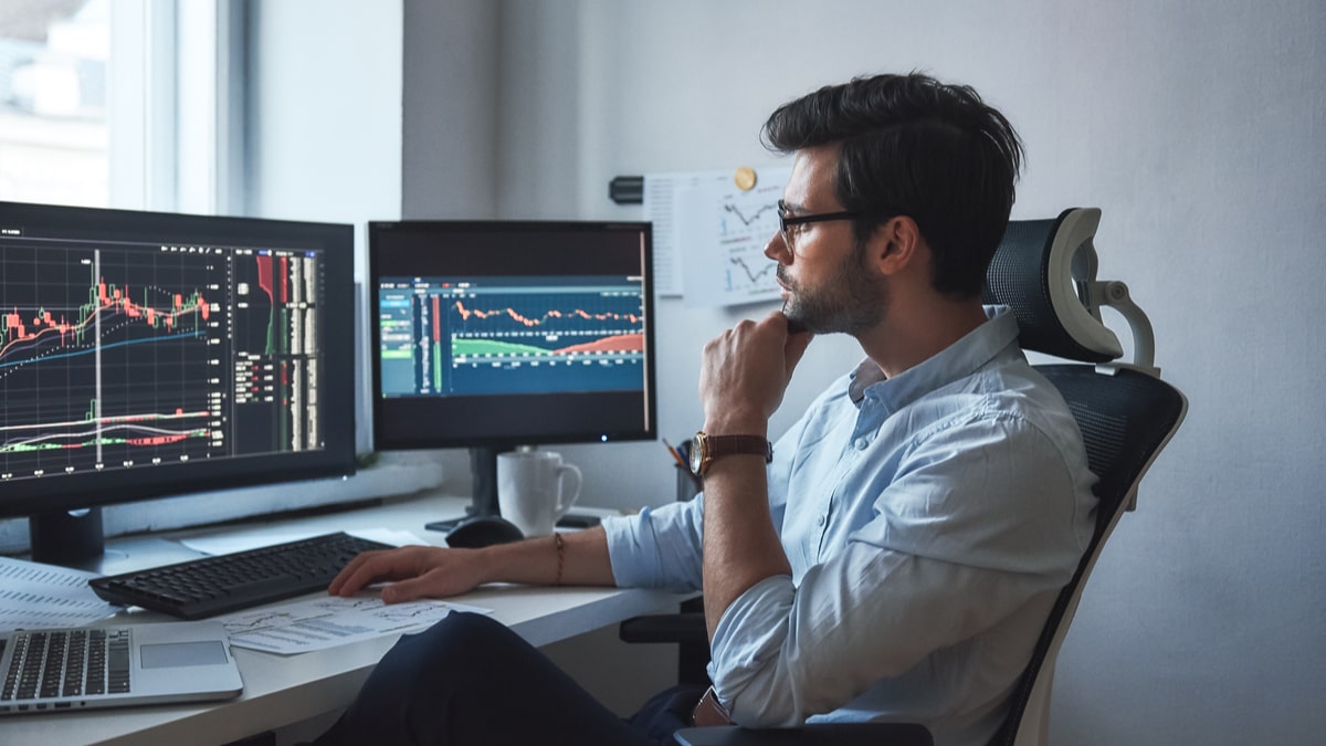 un trader au travail - définition megadico